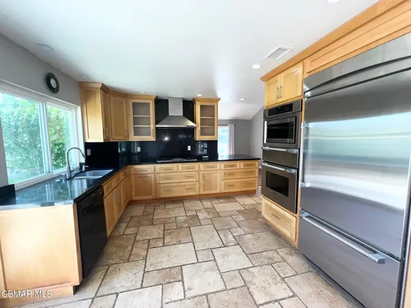 a view of a livingroom with wooden floor