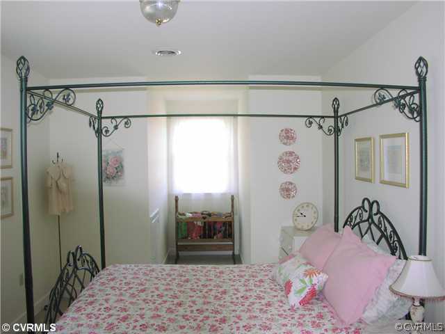 845 Broad St Road Manakin-Sabot, VA 23103 - Photo 11 of 12 a bedroom with a bed and a shower