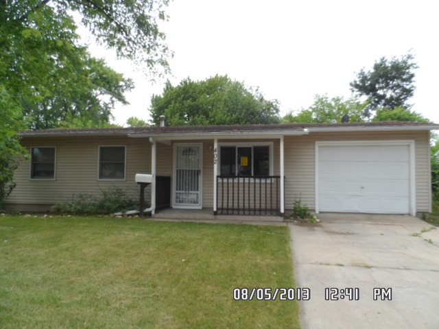 402 Garland Avenue Romeoville, IL 60446 - Photo 1 of 12 front view of a house with a yard