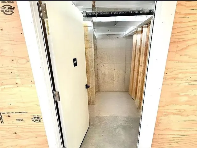 a view of bathroom with a tub and shower