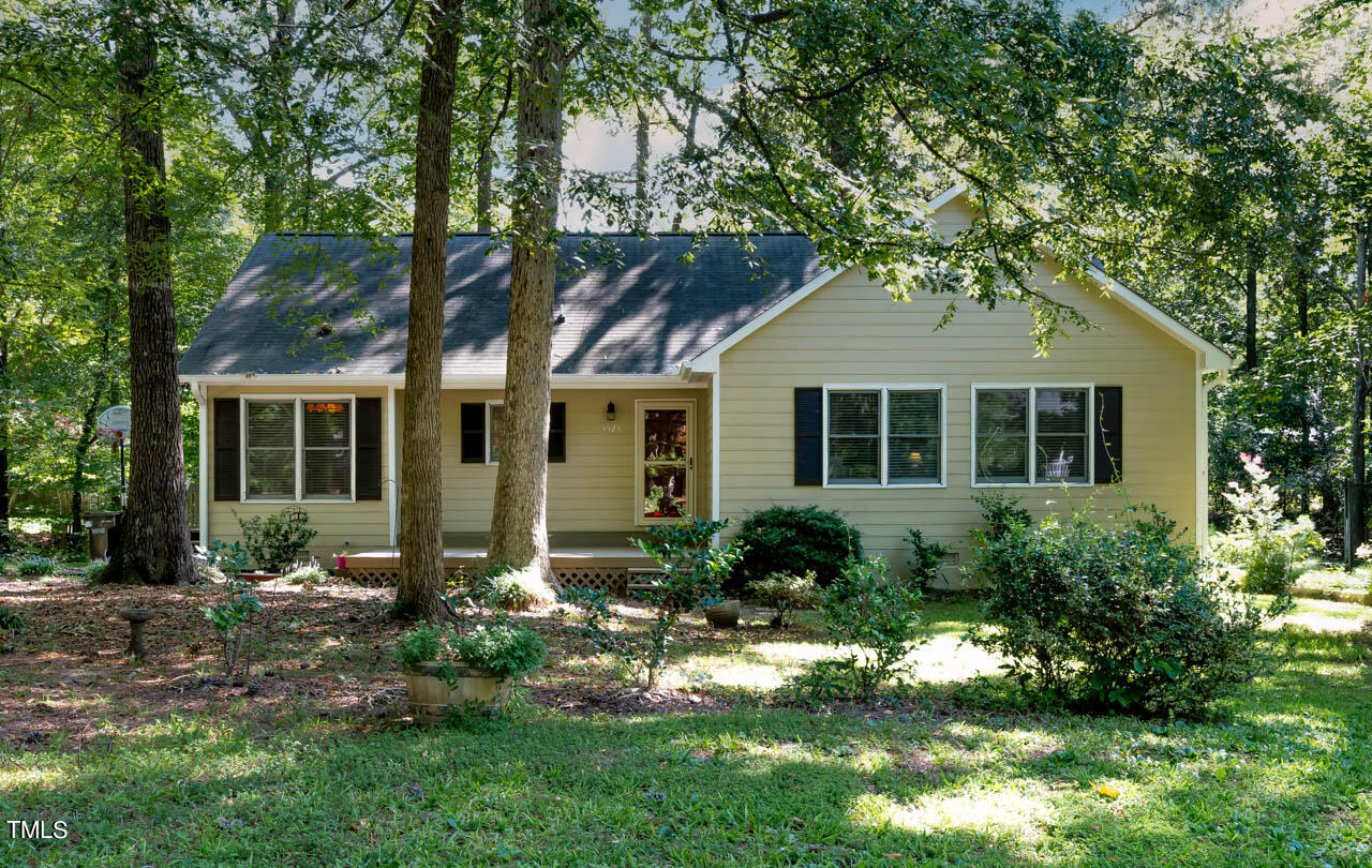 5525 Middleton Road Durham, NC 27713 - Photo 1 of 38 a front view of a house with a yard and porch