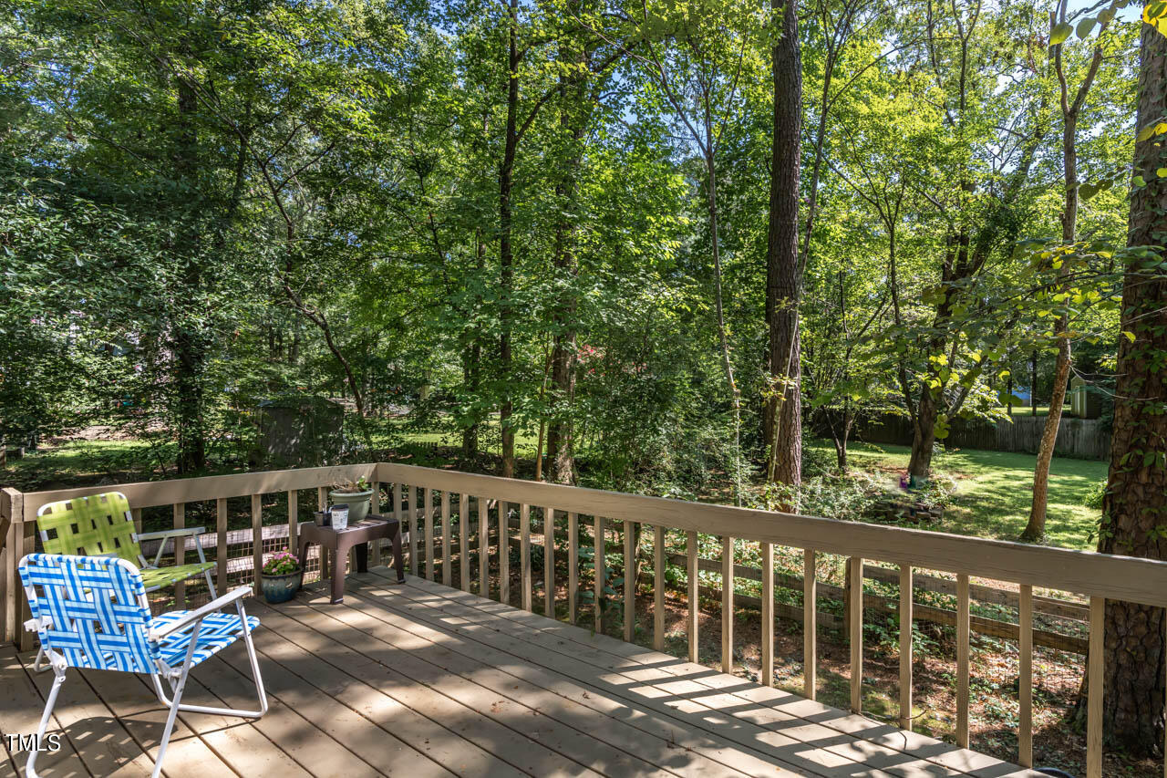5525 Middleton Road Durham, NC 27713 - Photo 11 of 38 a view of a chair and table on the wooden floor