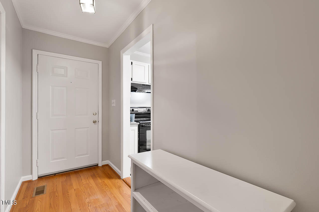 5525 Middleton Road Durham, NC 27713 - Photo 13 of 38 a bathroom with a tub and shower