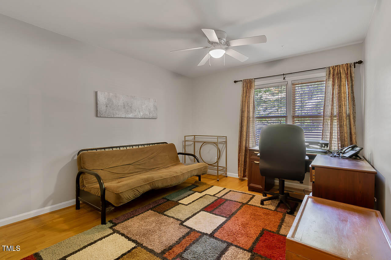 5525 Middleton Road Durham, NC 27713 - Photo 29 of 38 a living room with furniture and a window