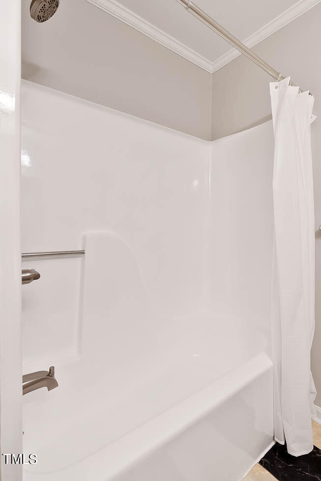 5525 Middleton Road Durham, NC 27713 - Photo 38 of 38 a bathroom with a shower