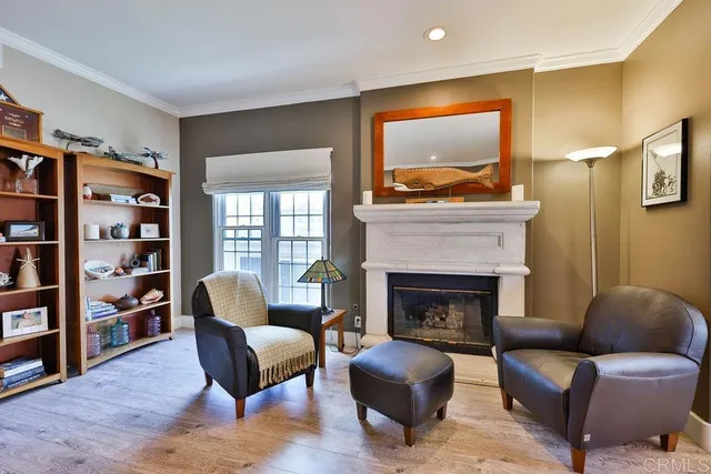 a kitchen with granite countertop cabinets stainless steel appliances a sink and a window