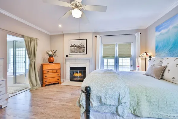 a bathroom with a granite countertop sink a shower and a bathtub