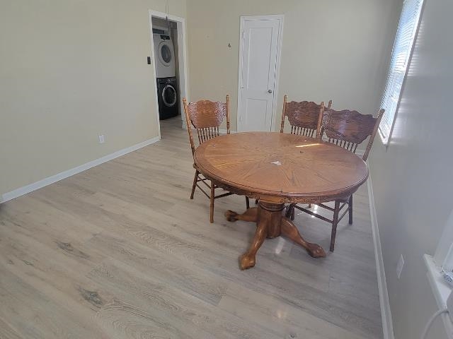 1480 Locust Street Memphis, TN 38108 - Photo 2 of 7 a view of a room with furniture and wooden floor