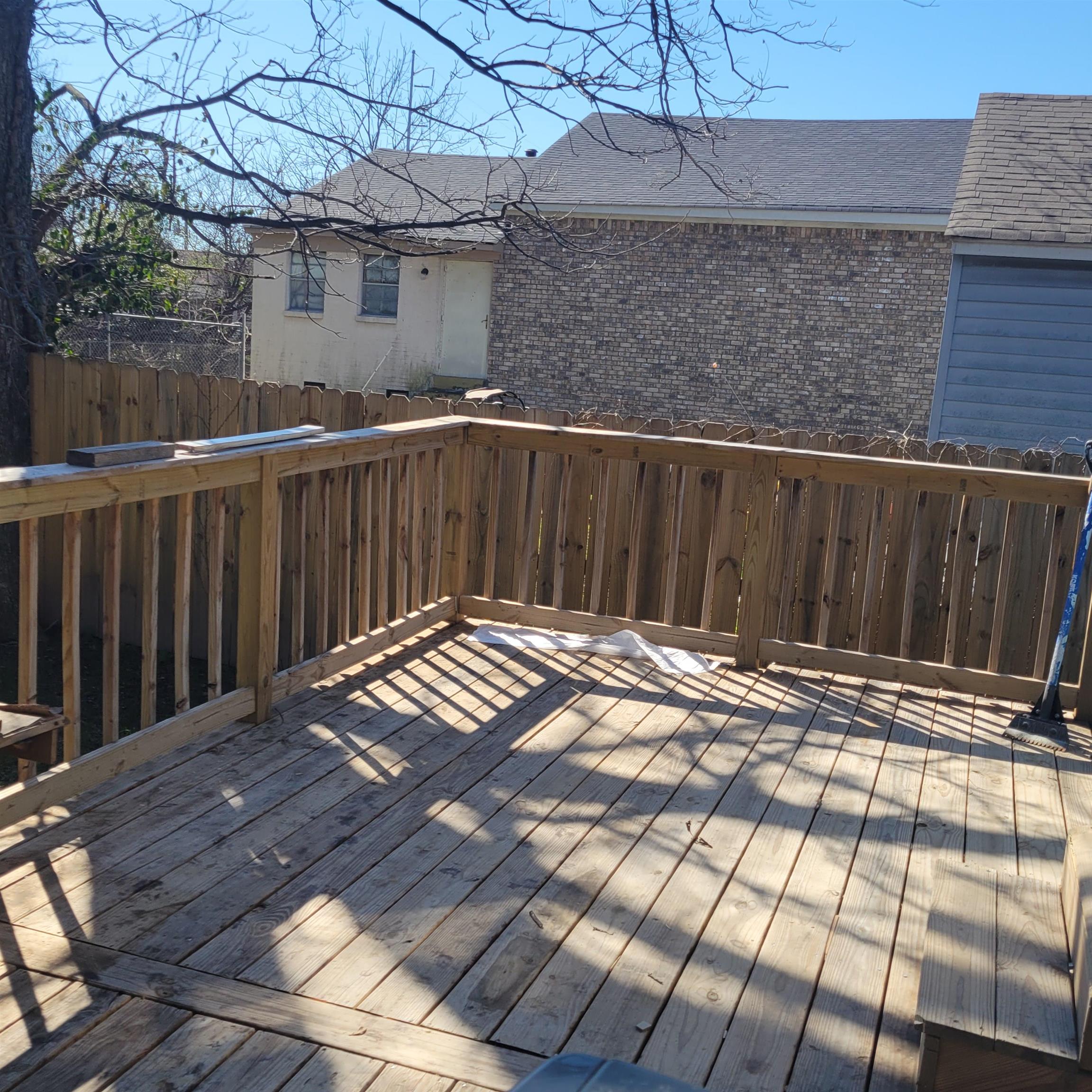 1480 Locust Street Memphis, TN 38108 - Photo 5 of 7 a view of a wooden fence