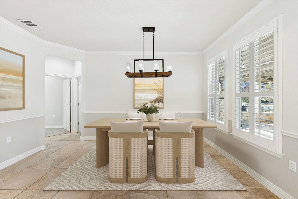 310 Pipe Creek Lane Georgetown, TX 78633 - Photo 10 of 35 a view of a dining room with furniture window and wooden floor