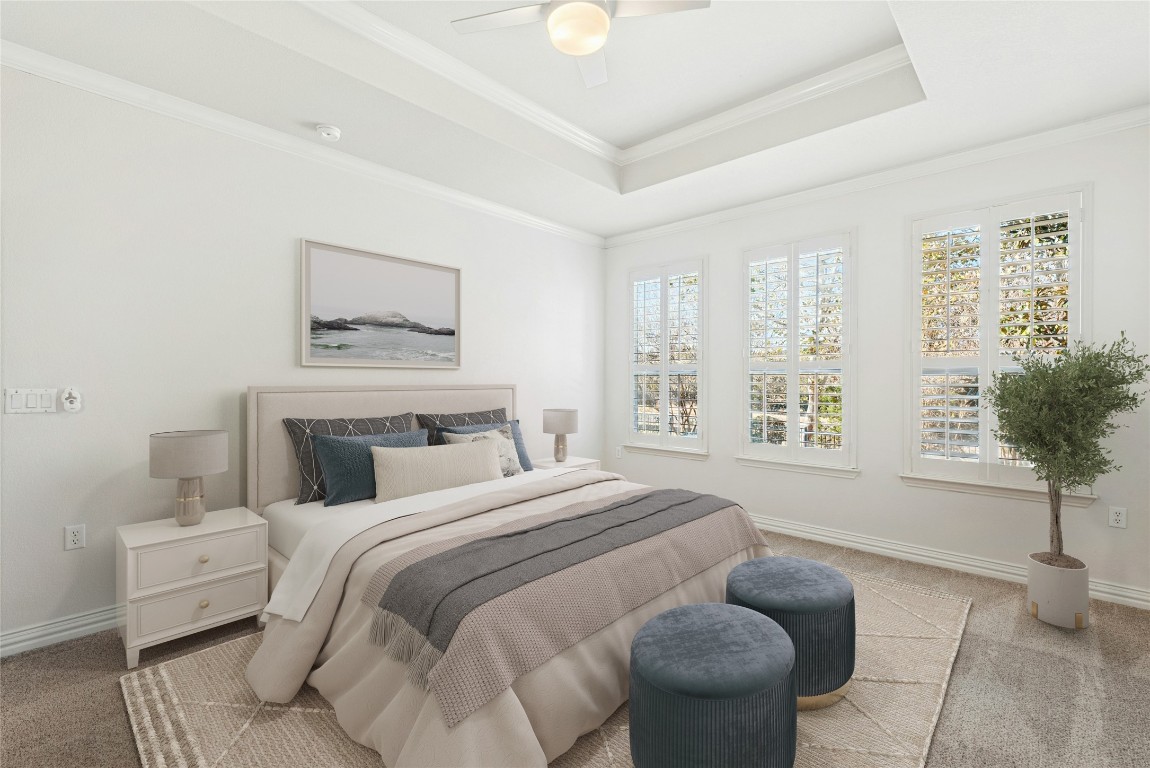 310 Pipe Creek Lane Georgetown, TX 78633 - Photo 16 of 35 a bedroom with a bed and a potted plant