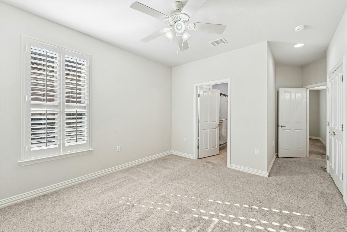 310 Pipe Creek Lane Georgetown, TX 78633 - Photo 22 of 35 a view of an empty room with a window
