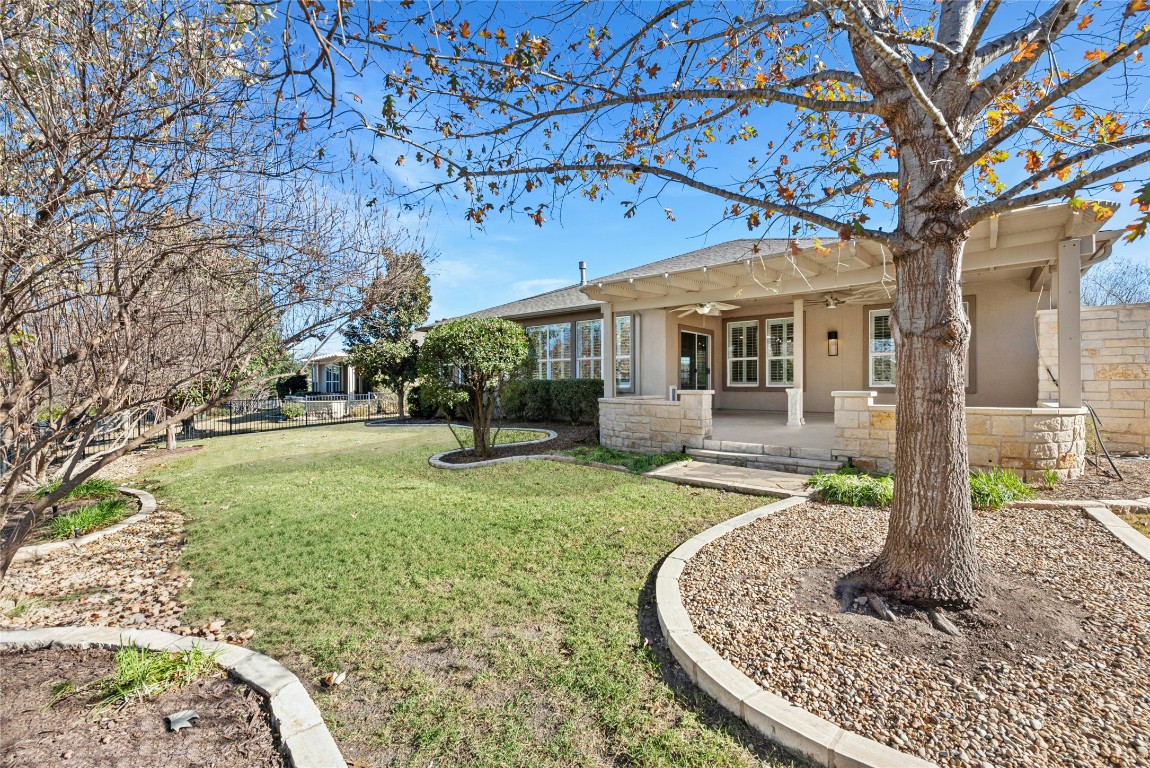 310 Pipe Creek Lane Georgetown, TX 78633 - Photo 29 of 35 a front view of a house with garden