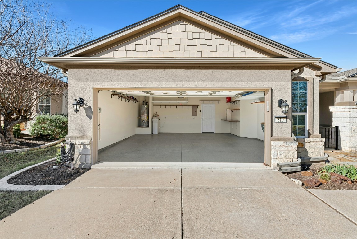 310 Pipe Creek Lane Georgetown, TX 78633 - Photo 2 of 35 a view of a house with garage