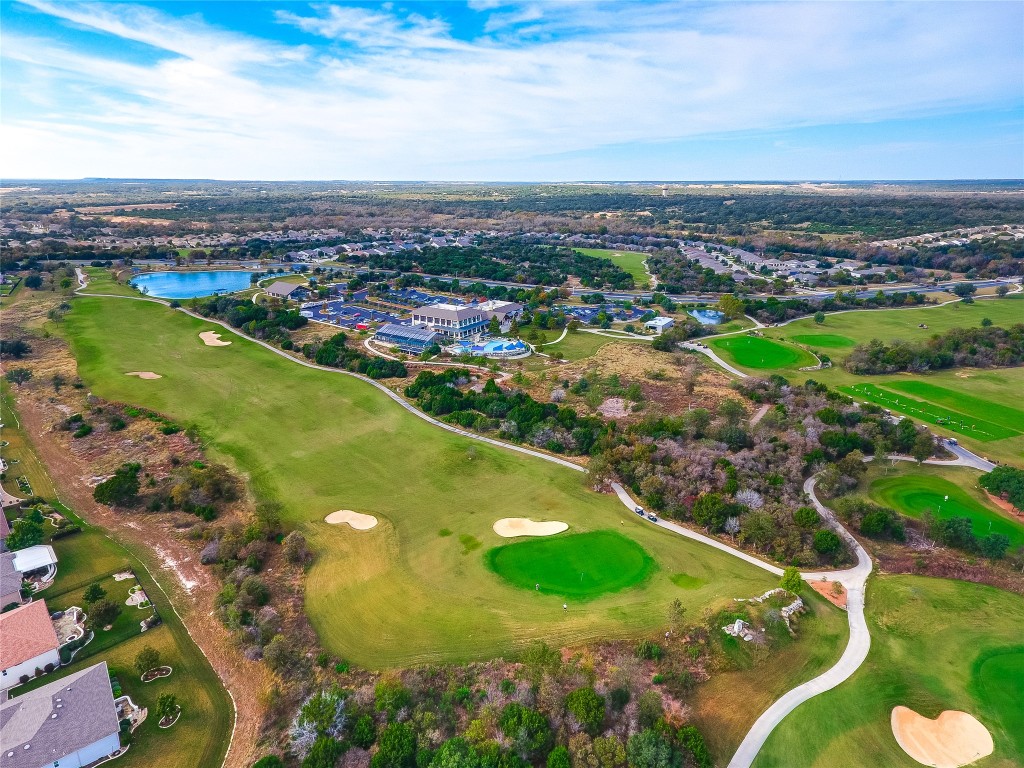 310 Pipe Creek Lane Georgetown, TX 78633 - Photo 31 of 35 an aerial view of residential houses with outdoor space