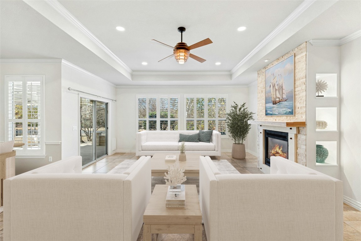 310 Pipe Creek Lane Georgetown, TX 78633 - Photo 6 of 35 a living room with fireplace furniture and a large window