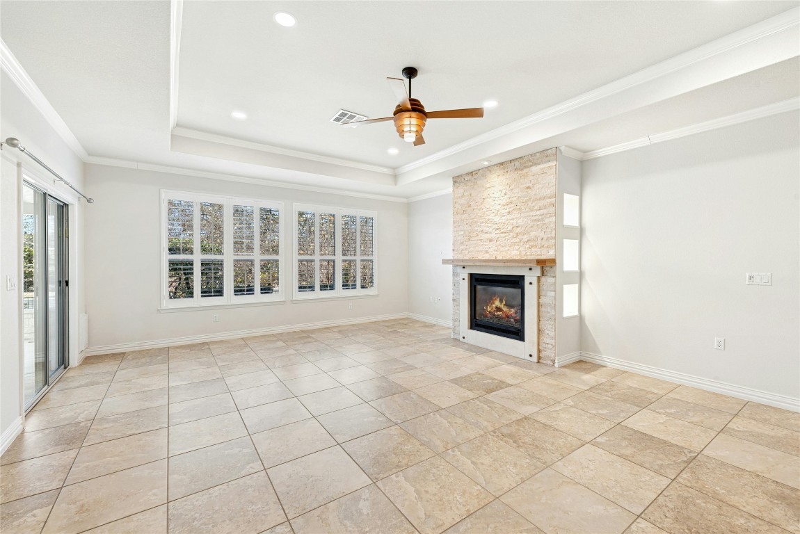 310 Pipe Creek Lane Georgetown, TX 78633 - Photo 7 of 35 a view of an empty room with glass door and a window