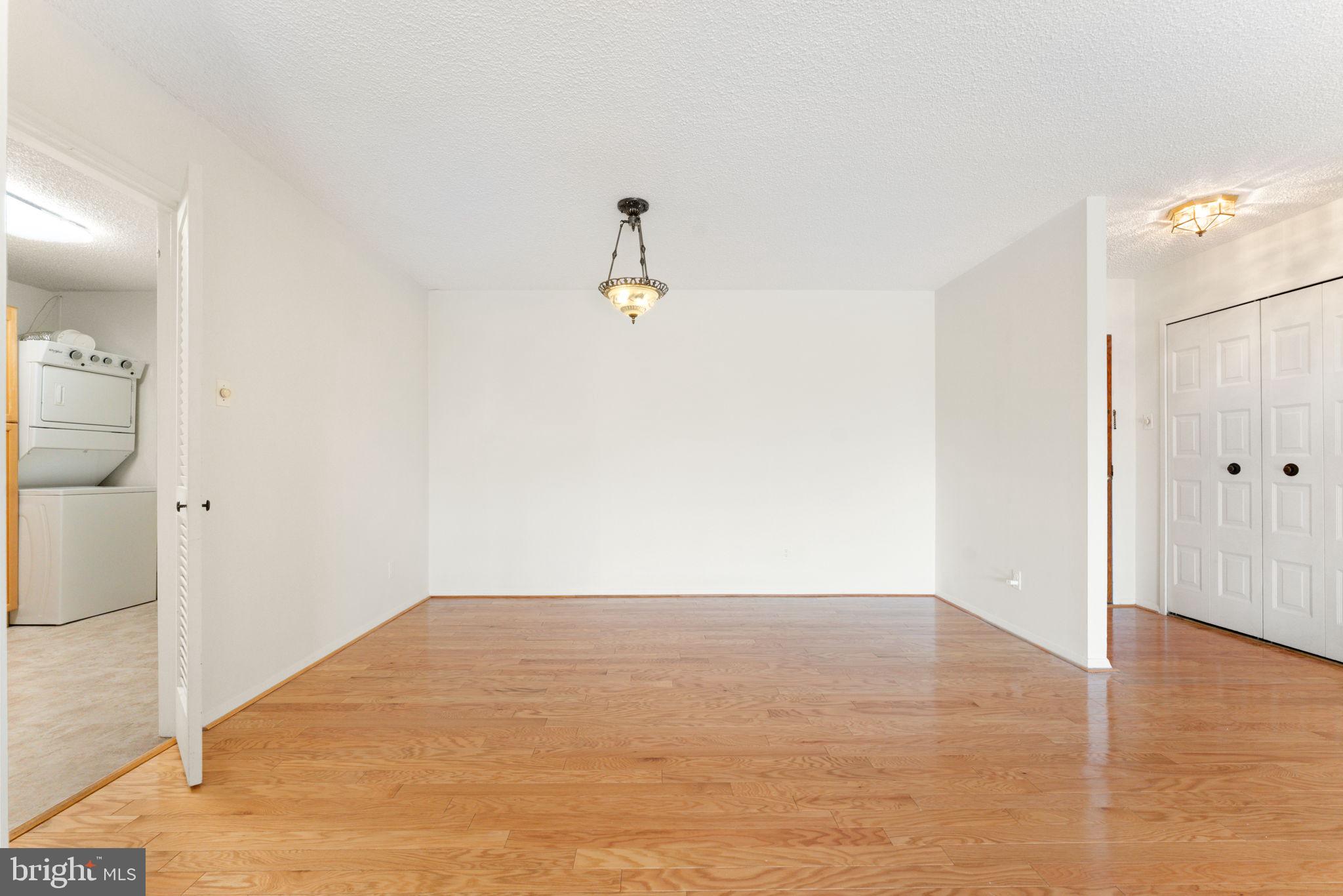 1800 Old Meadow Road, Unit 1218 McLean, VA 22102 - Photo 21 of 55 a view of a room with wooden floor and bathroom