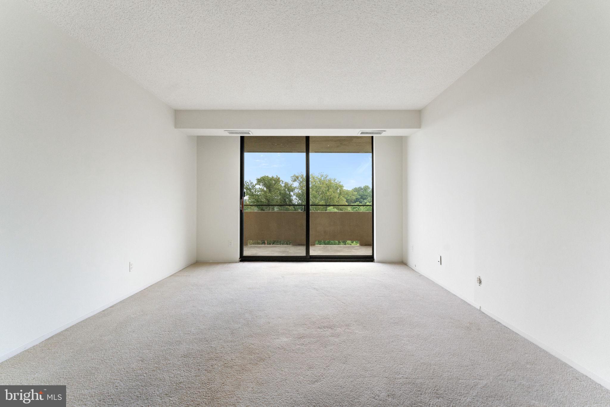 1800 Old Meadow Road, Unit 1218 McLean, VA 22102 - Photo 31 of 55 a view of a room with a large window