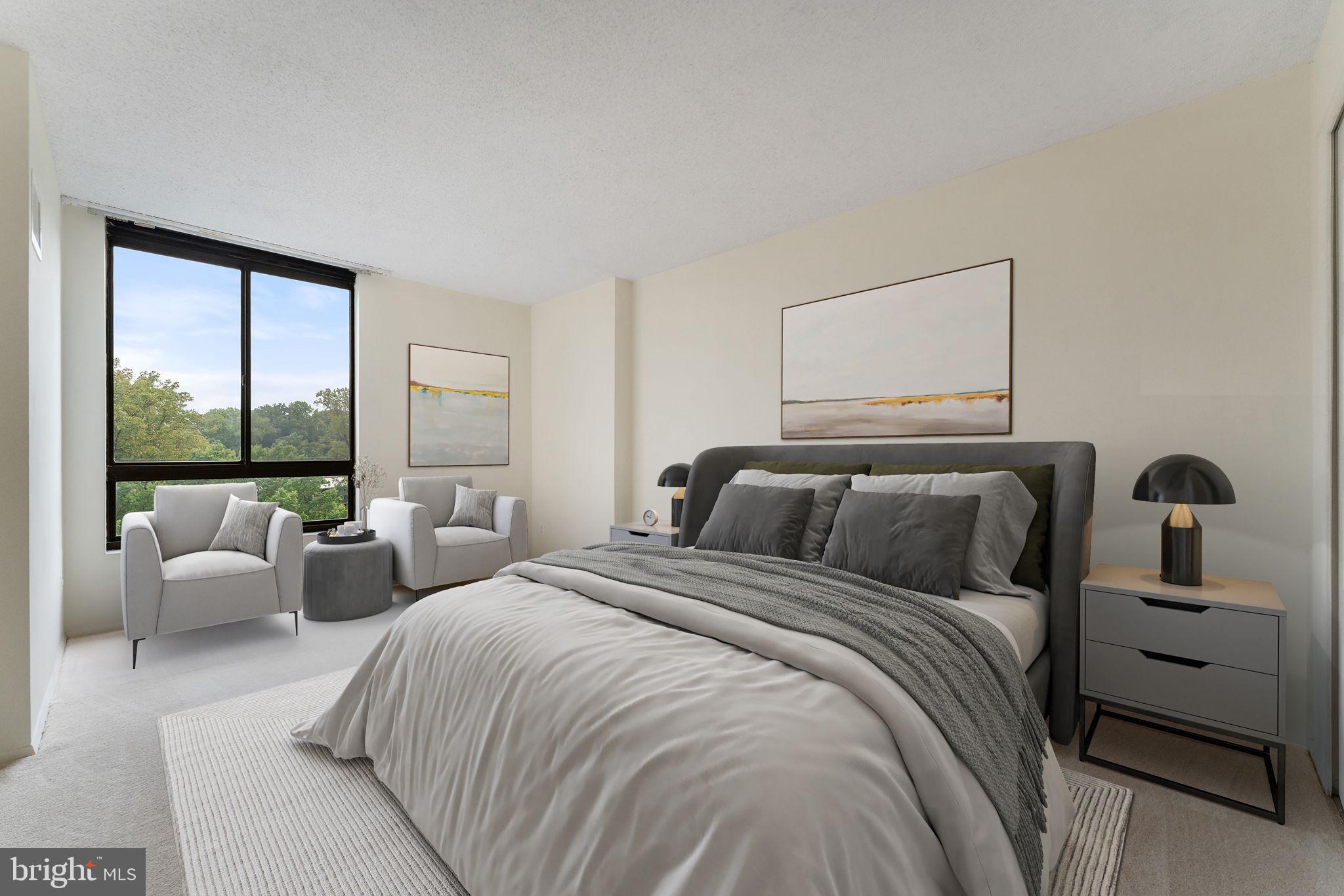 1800 Old Meadow Road, Unit 1218 McLean, VA 22102 - Photo 36 of 55 a bedroom with a bed and large window