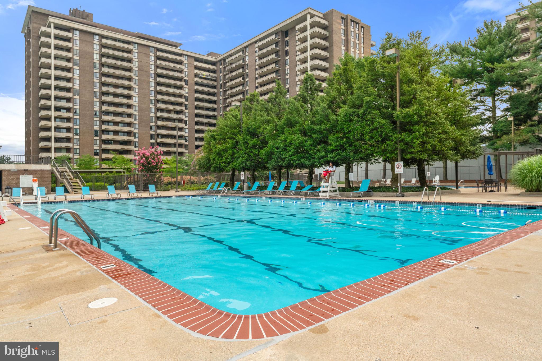 1800 Old Meadow Road, Unit 1218 McLean, VA 22102 - Photo 51 of 55 swimming pool view with a garden space