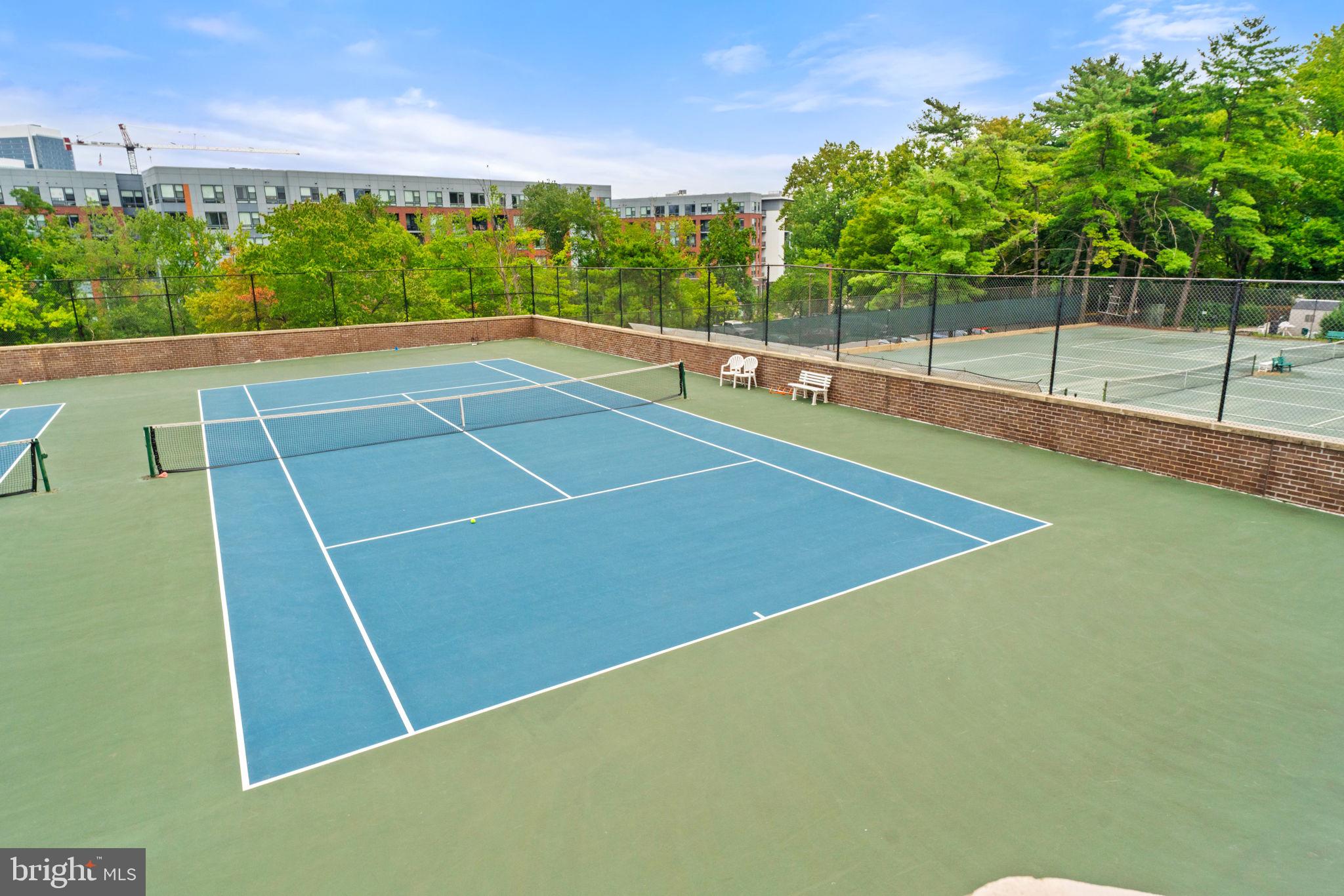 1800 Old Meadow Road, Unit 1218 McLean, VA 22102 - Photo 55 of 55 a view of a tennis court
