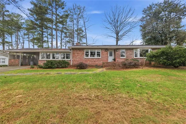 front view of house with a yard