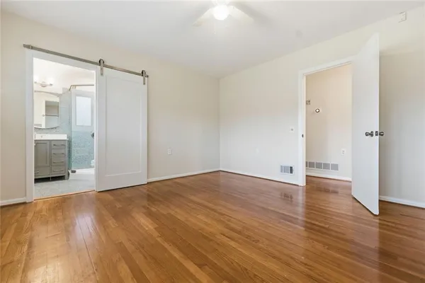 a work room with furniture and a window