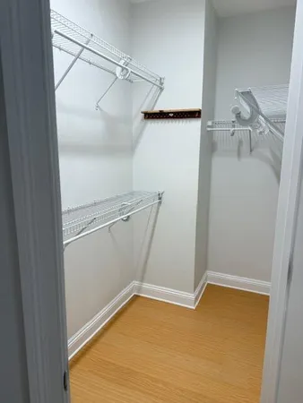 a view of a room with racks on the wall