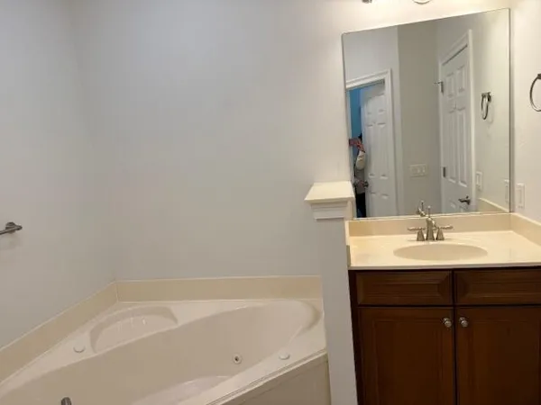 a bathroom with a sink and a bathtub