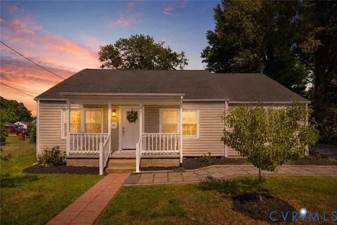 a house view with a garden space