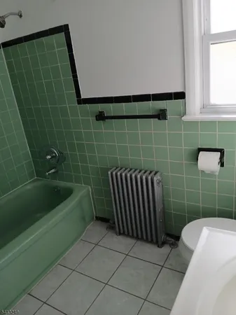 a bathroom with a sink and a shower