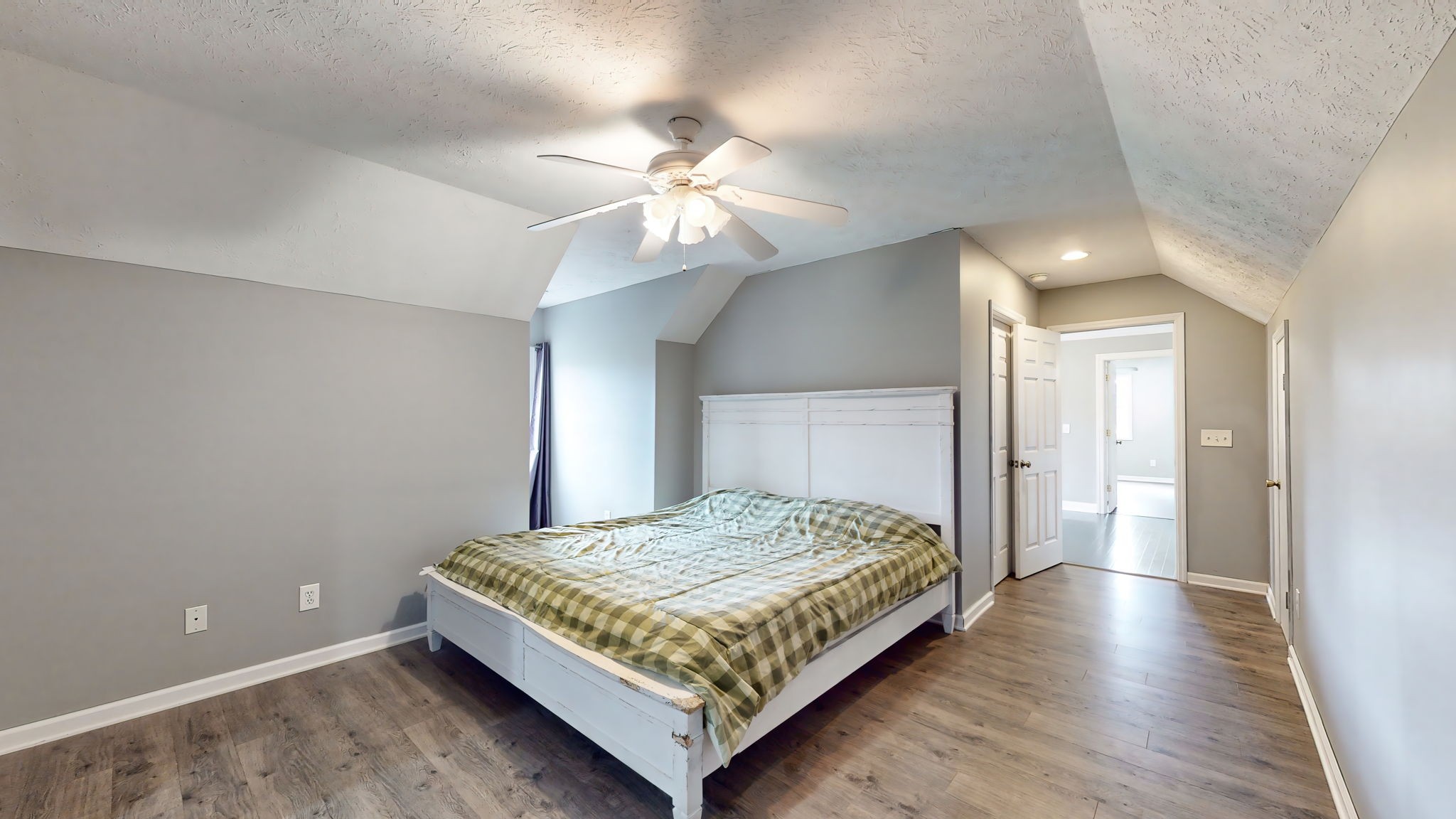 6697 Greenvale Road Watertown, TN 37184 - Photo 24 of 36 a bedroom with a bed and a chandelier