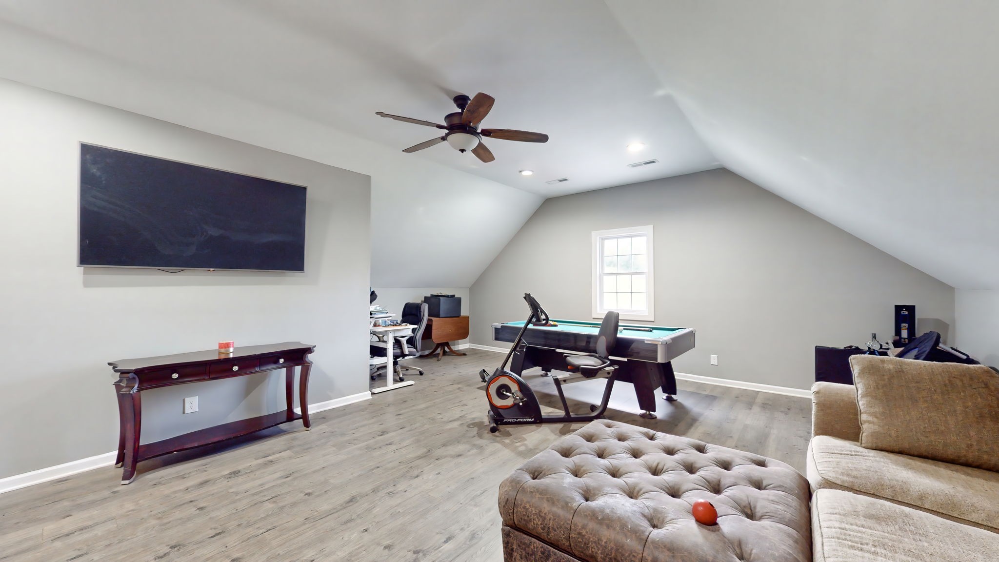 6697 Greenvale Road Watertown, TN 37184 - Photo 25 of 36 a living room with furniture and a flat screen tv