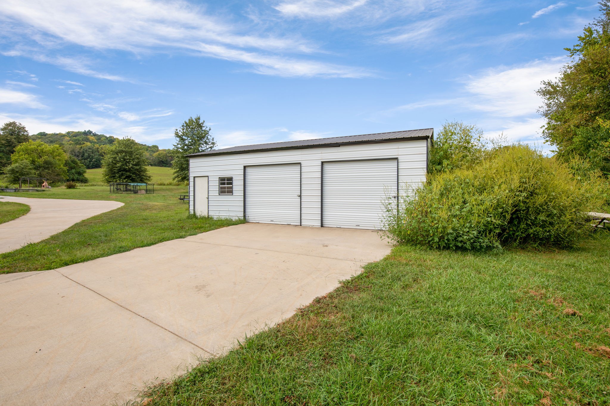 6697 Greenvale Road Watertown, TN 37184 - Photo 30 of 36 a house with yard in front of it
