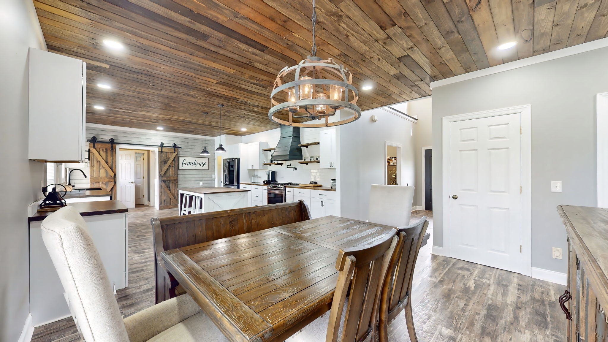 6697 Greenvale Road Watertown, TN 37184 - Photo 4 of 36 a view of a dining room with furniture and wooden floor