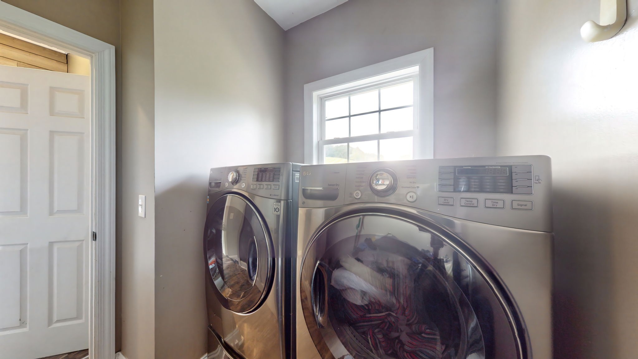 6697 Greenvale Road Watertown, TN 37184 - Photo 10 of 36 a utility room with dryer and washer