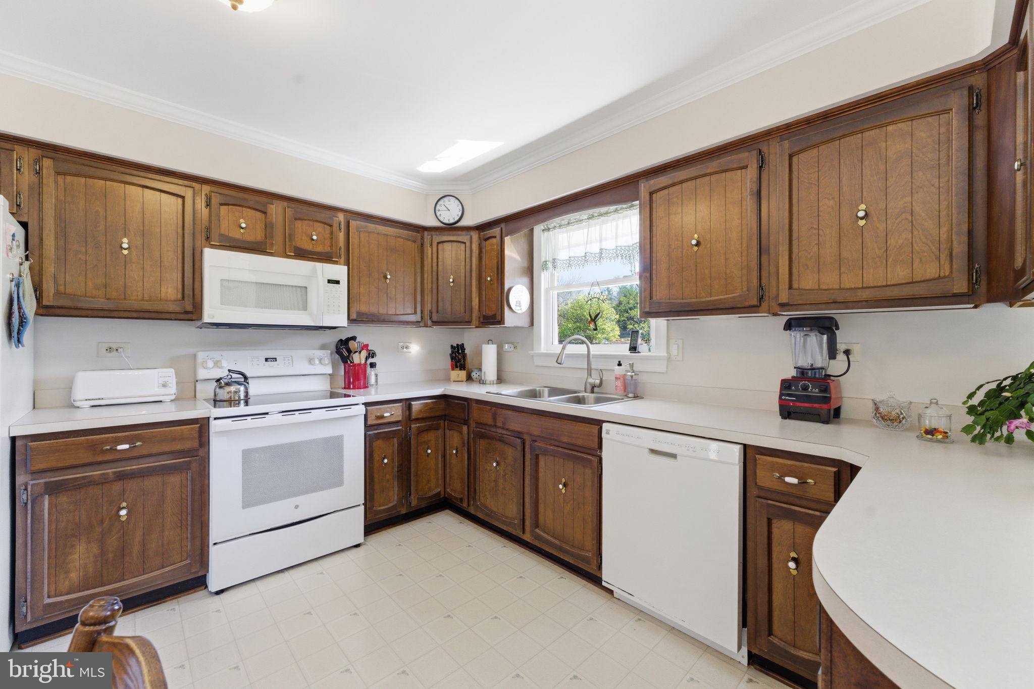 6163 Georgetown Road Broad Run, VA 20137 - Photo 21 of 94 a kitchen with a sink cabinets and window