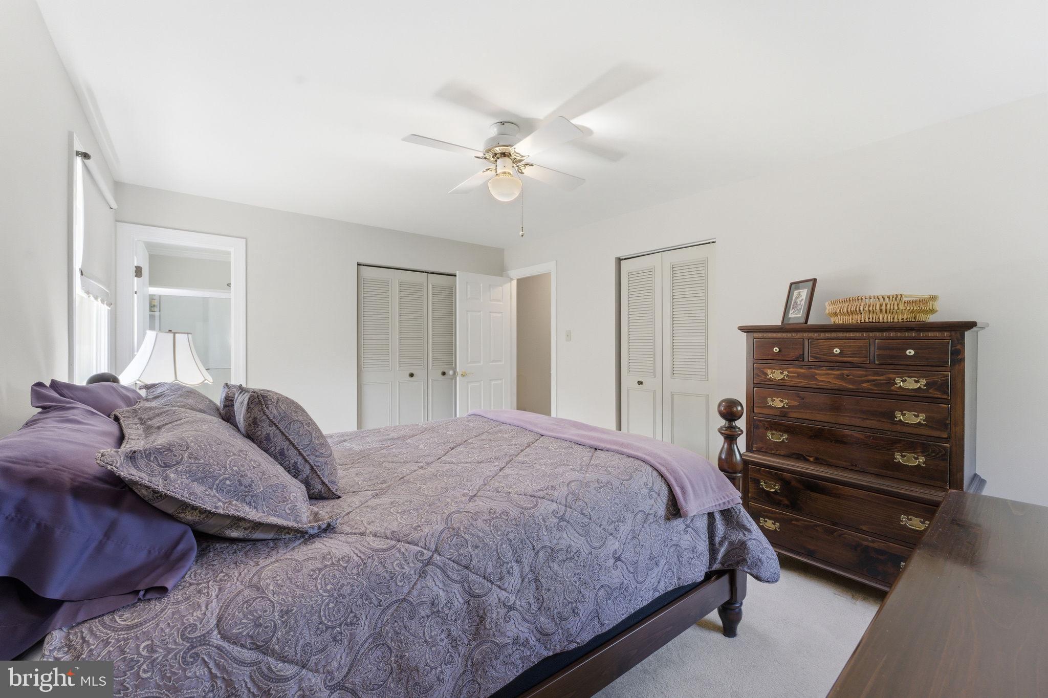 6163 Georgetown Road Broad Run, VA 20137 - Photo 29 of 94 a bedroom with a bed and a ceiling fan