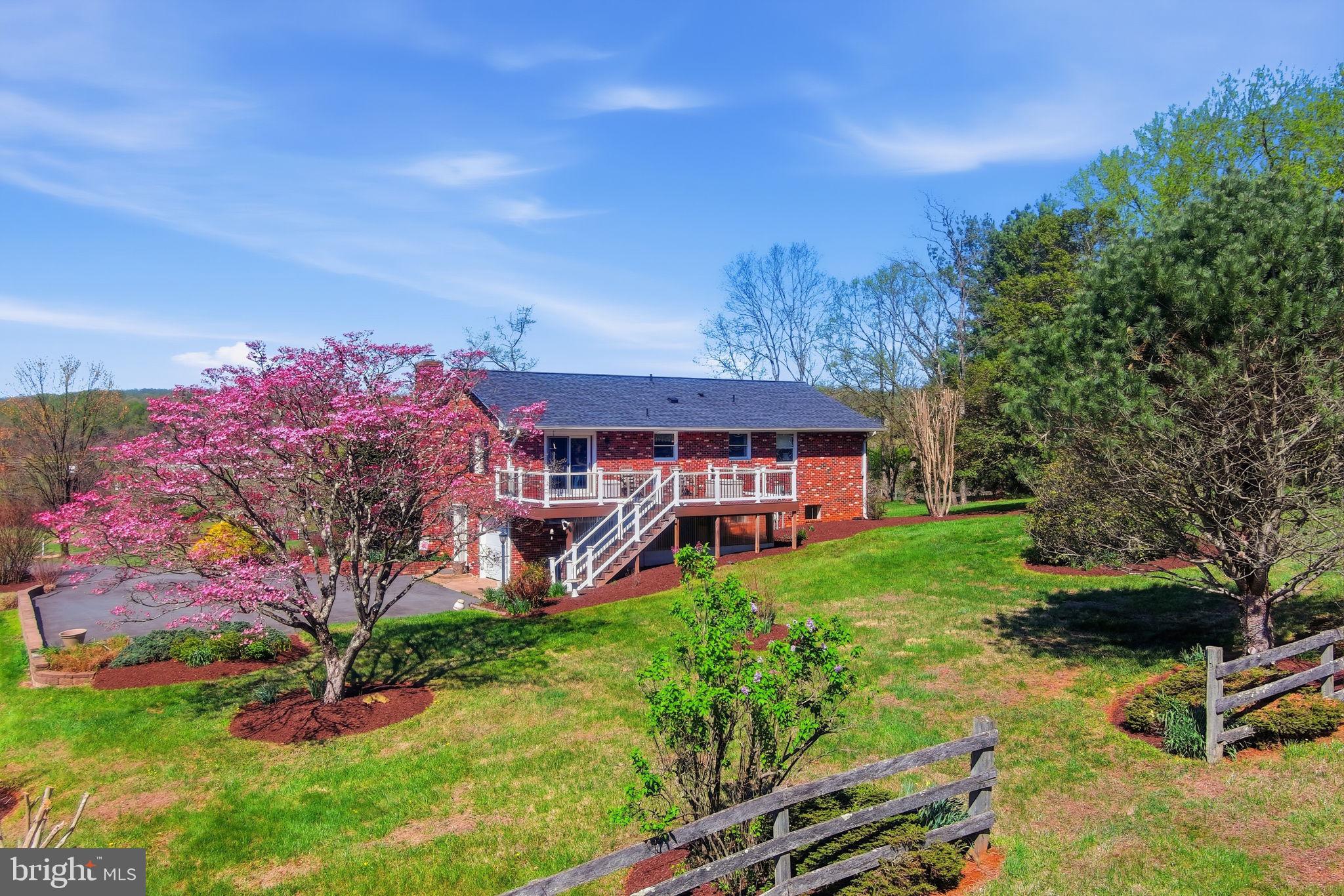 6163 Georgetown Road Broad Run, VA 20137 - Photo 3 of 94 a view of a house with a yard