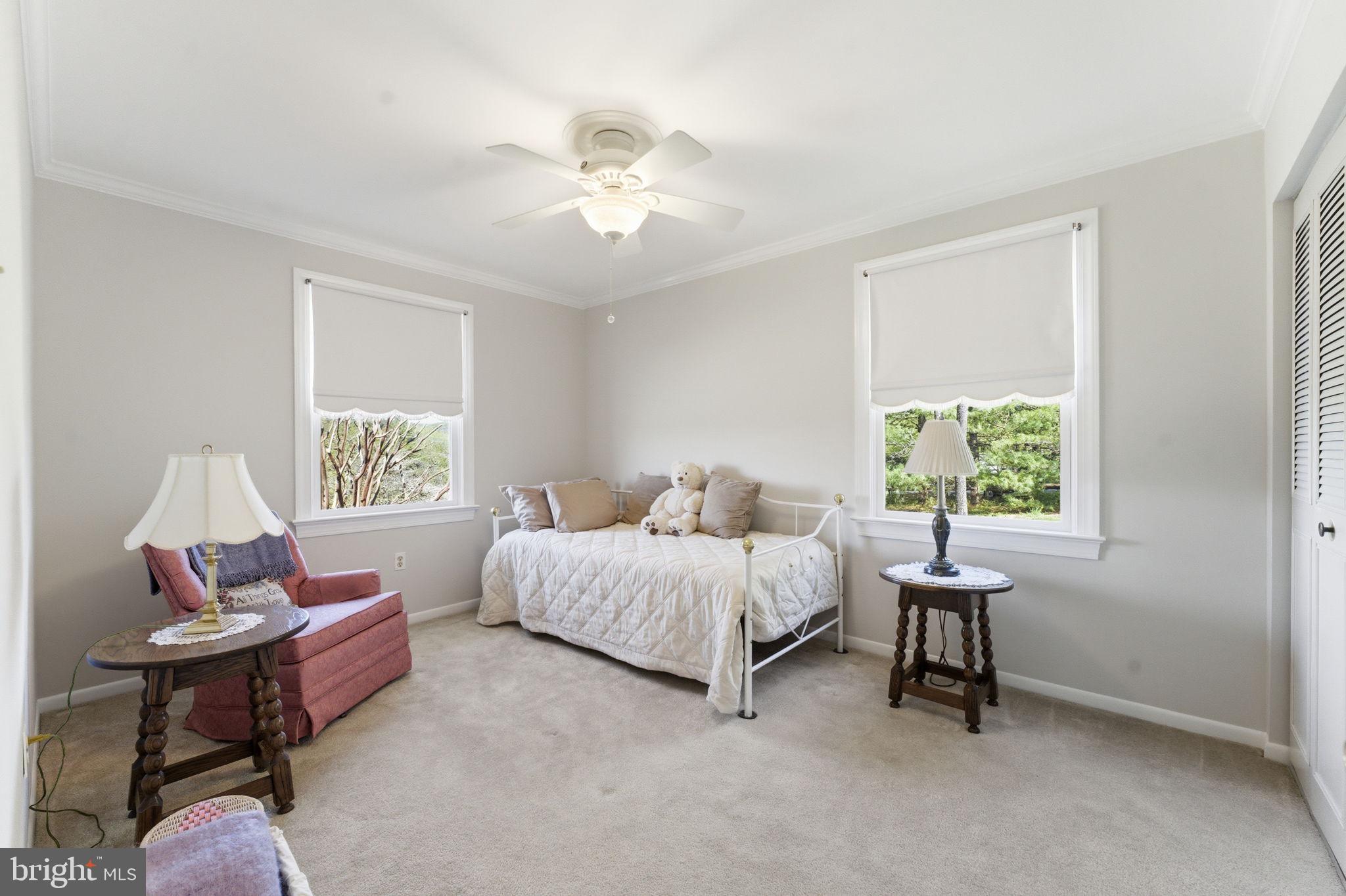 6163 Georgetown Road Broad Run, VA 20137 - Photo 32 of 94 a spacious bedroom with a bed and a window