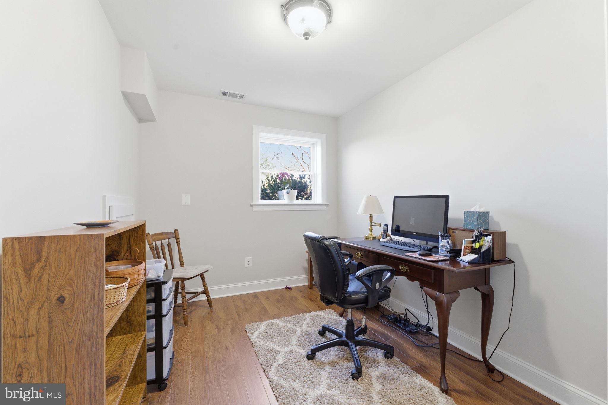 6163 Georgetown Road Broad Run, VA 20137 - Photo 43 of 94 a view of a workspace with furniture and a window