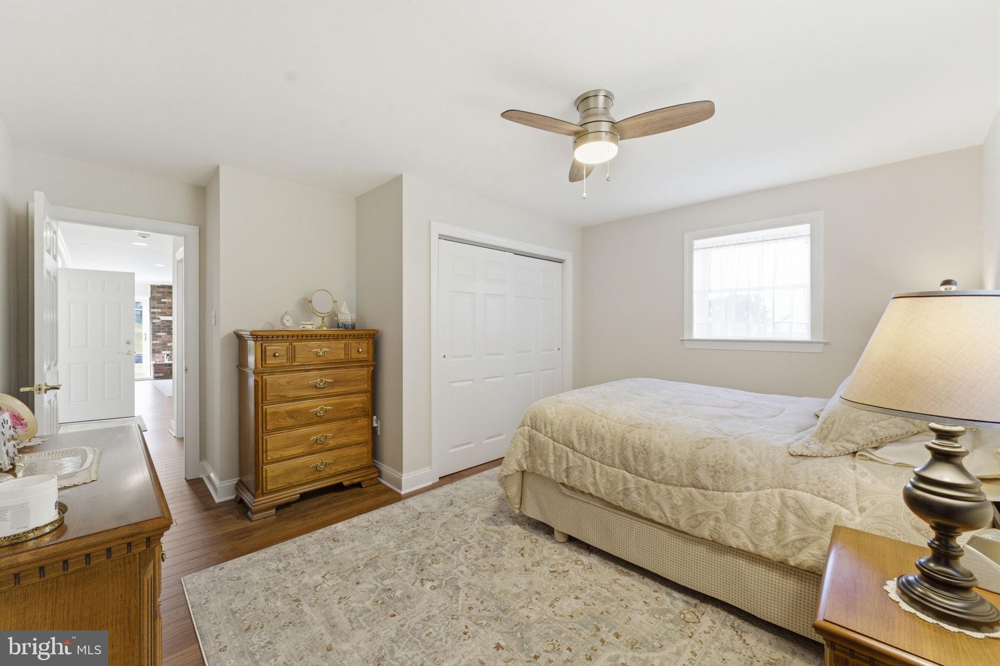 6163 Georgetown Road Broad Run, VA 20137 - Photo 48 of 94 a bedroom with a bed and a dresser