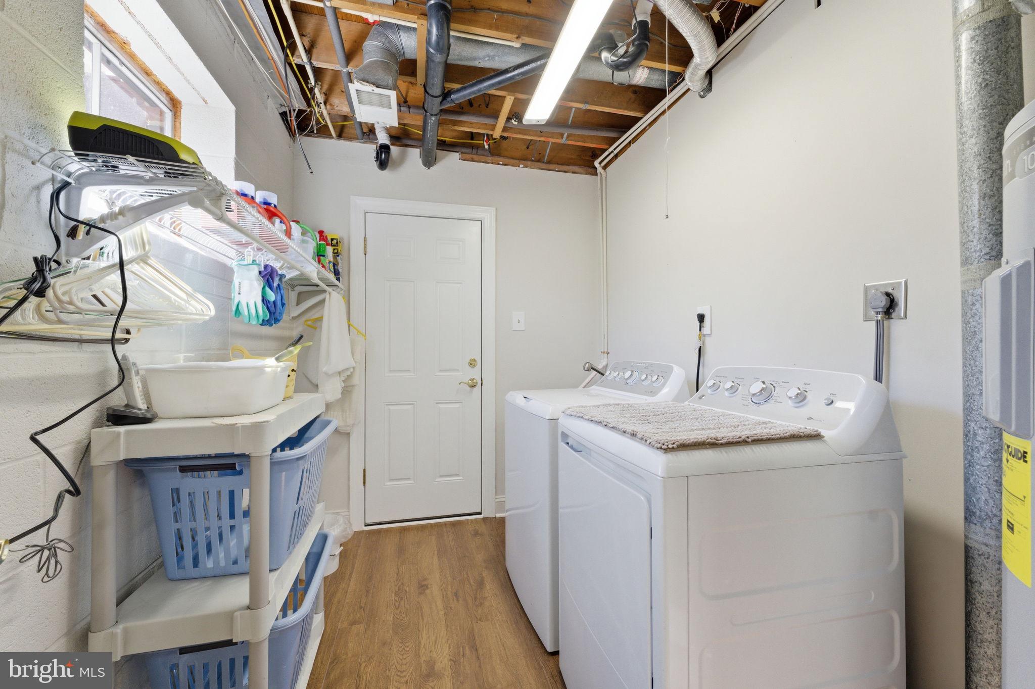 6163 Georgetown Road Broad Run, VA 20137 - Photo 50 of 94 a utility room with dryer and washer