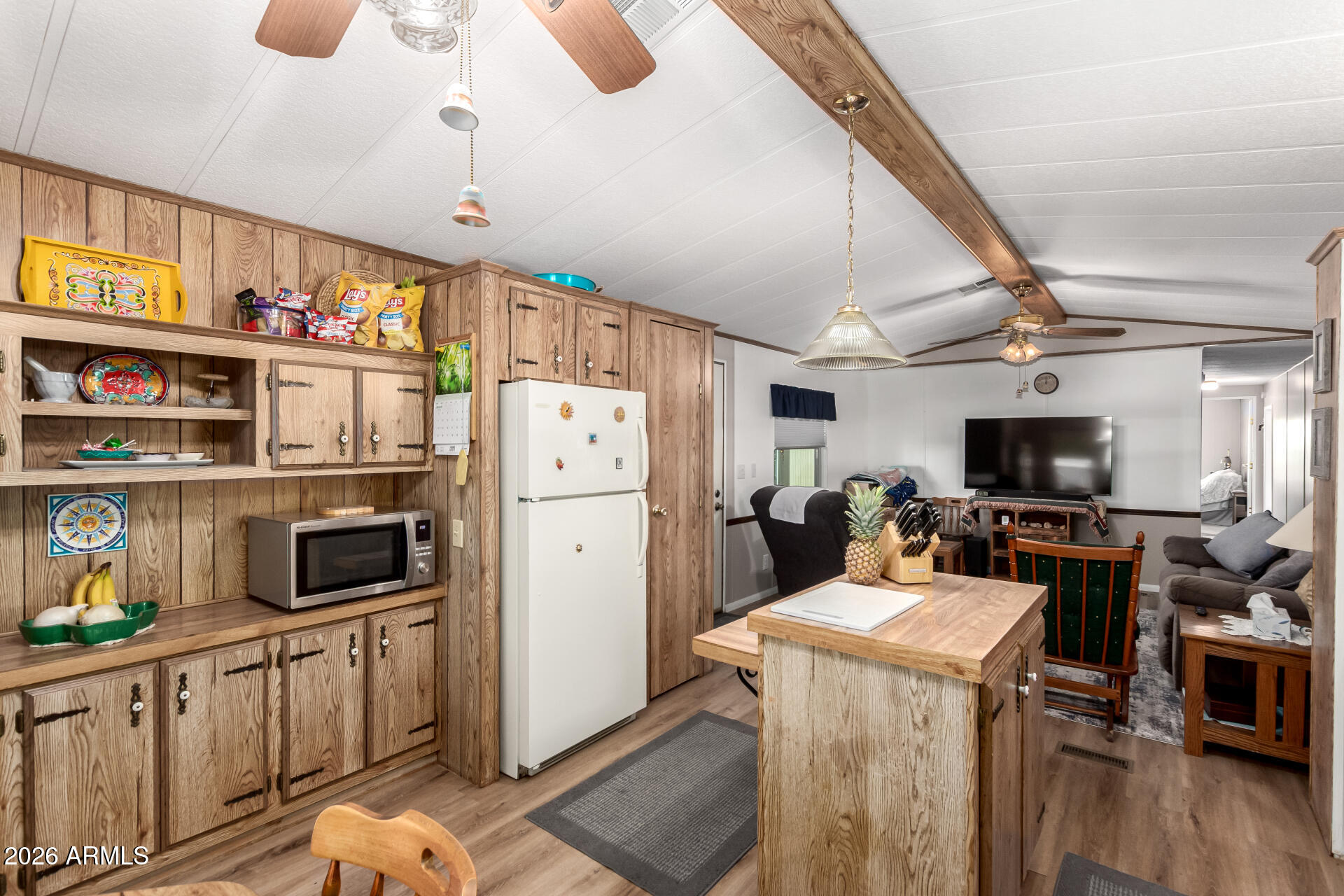 269 North Winchester Road, Unit 66 Apache Junction, AZ 85119 - Photo 11 of 28 a view of living room with furniture and flat screen tv