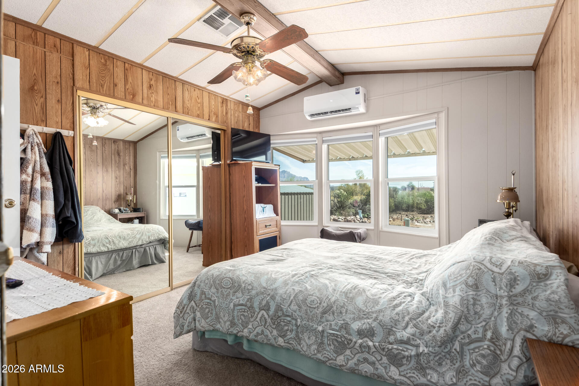 269 North Winchester Road, Unit 66 Apache Junction, AZ 85119 - Photo 14 of 28 a bedroom with a bed couch and large window