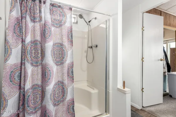 a bathroom with a shower curtain