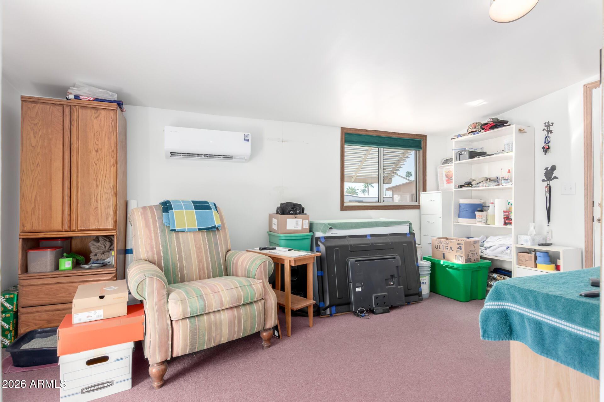 269 North Winchester Road, Unit 66 Apache Junction, AZ 85119 - Photo 21 of 28 a living room with furniture and a window
