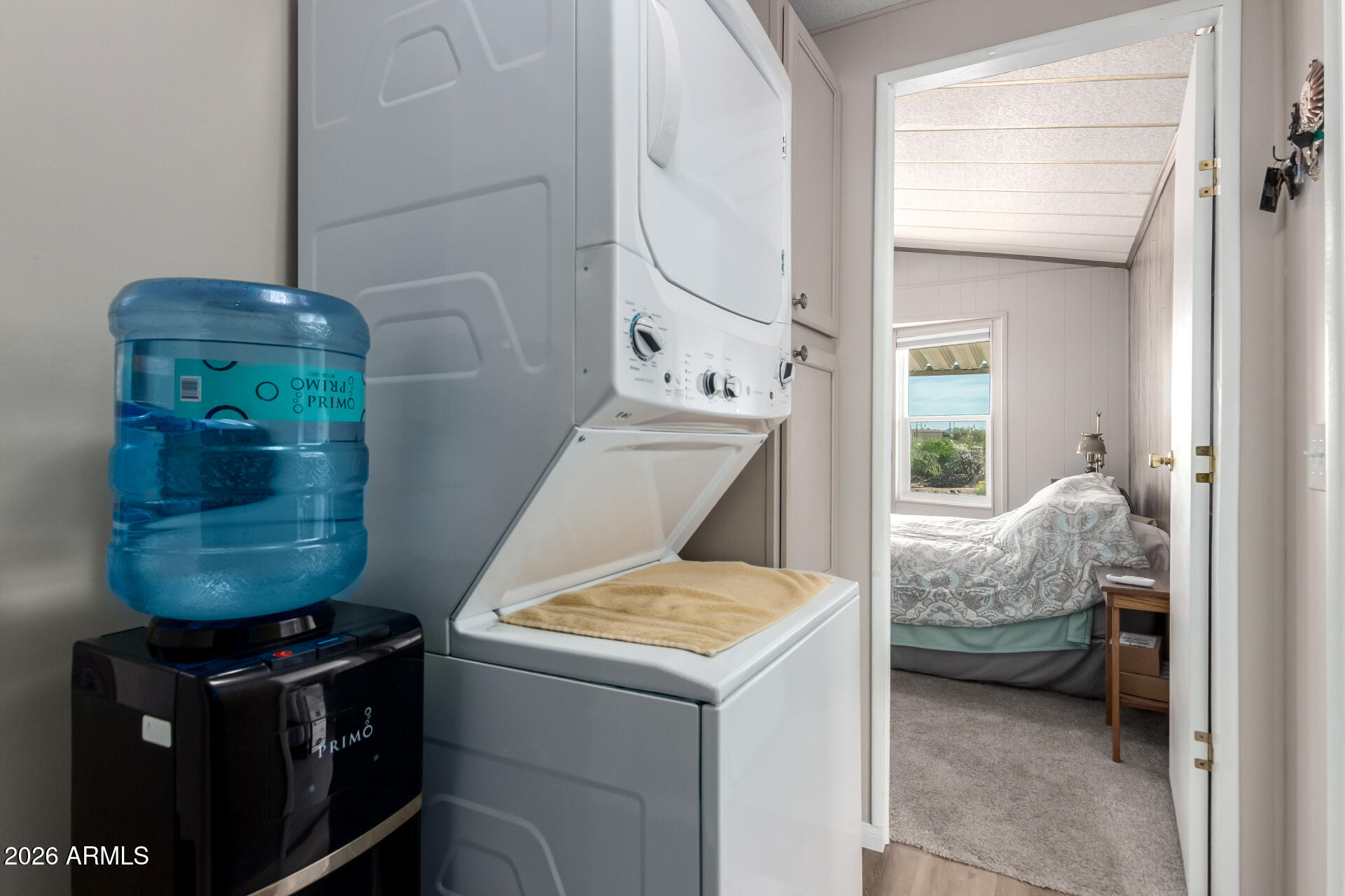 269 North Winchester Road, Unit 66 Apache Junction, AZ 85119 - Photo 25 of 28 a utility room with dryer and washer