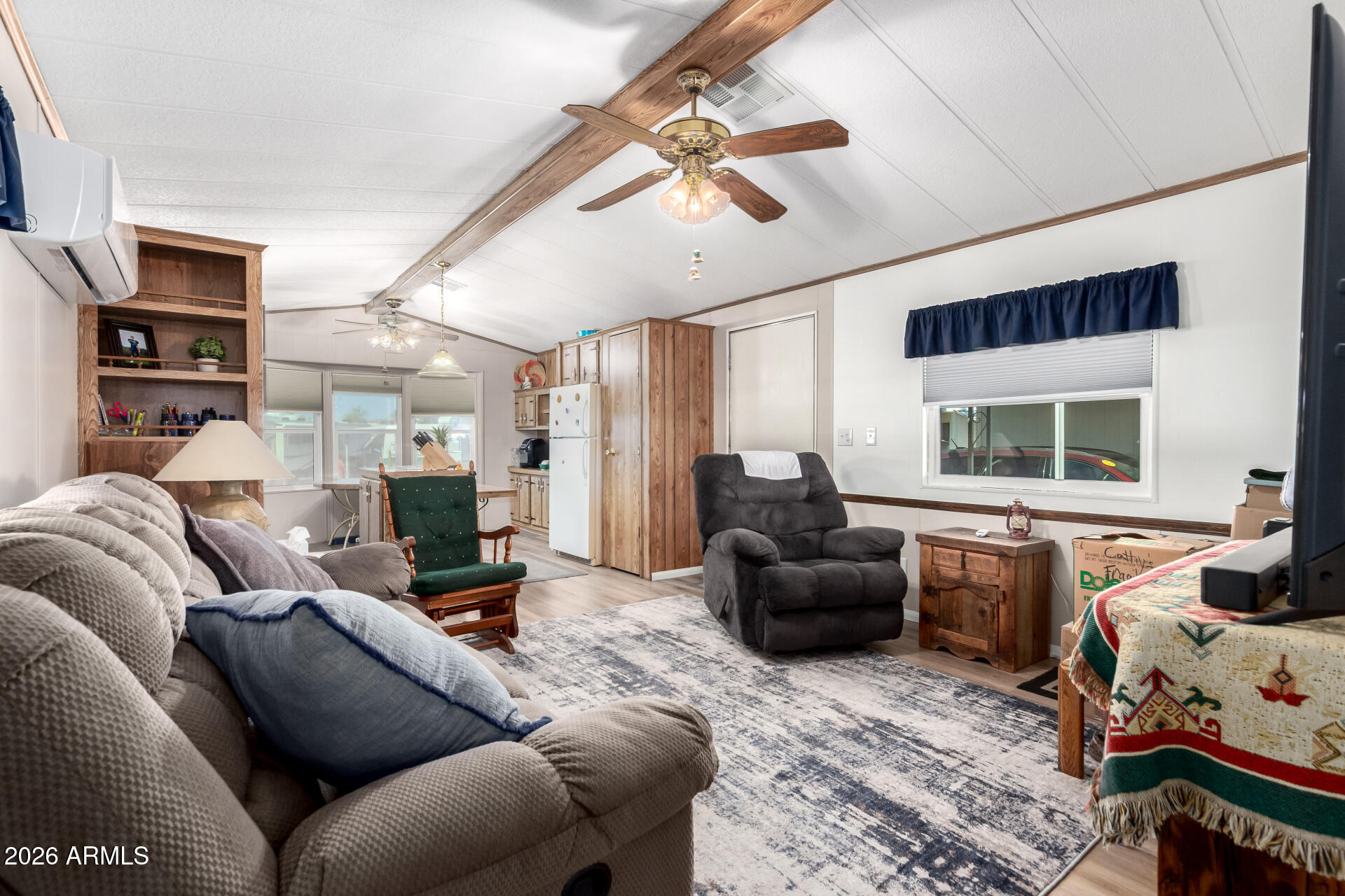 269 North Winchester Road, Unit 66 Apache Junction, AZ 85119 - Photo 7 of 28 a living room with furniture and a window